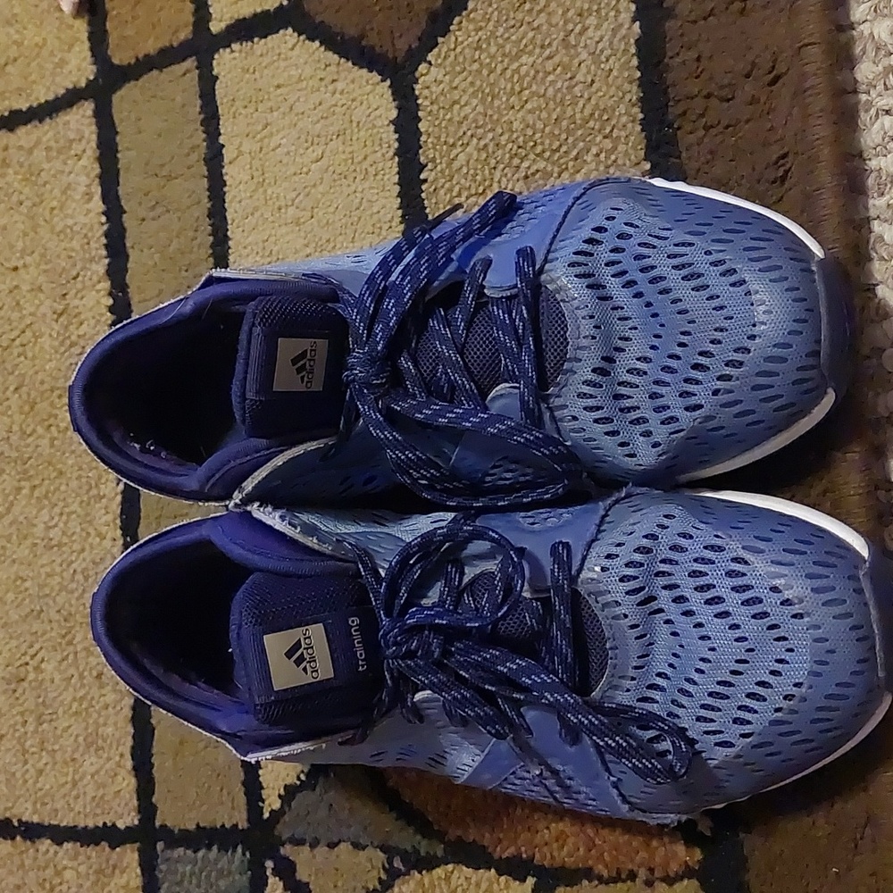 A pair of a Adidas women size7
